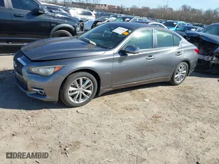 2014 Infiniti Q50 Hybrid Premium with VIN JN1AV7AR1EM700236, listed as a IAAI auction lot 41655090 with 15,481 mi miles. Bid and sale history available at carsss.com. Image 17.