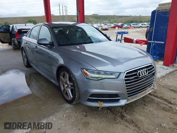 2016 Audi A6 3.0T Premium Plus with VIN WAUFGAFC1GN047352, listed as a IAAI auction lot 41934958 with 111,834 mi miles. Bid and sale history available at carsss.com. Image 1.
