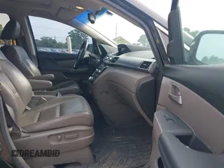 2011 Honda Odyssey Touring with VIN 5FNRL5H90BB070472, listed as a IAAI auction lot 42367710 with 203,589 mi miles and . Bid and sale history available at DreamBid. Image 5.