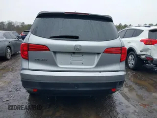 2017 Honda Pilot EX-L with VIN 5FNYF6H51HB069068, listed as a IAAI auction lot 41567728 with 100,618 mi miles and . Bid and sale history available at DreamBid. Image 16.