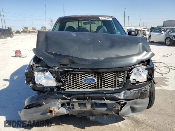 2000 Ford F-150 XL с VIN 1FTZX0726YKB47787, выставлен на аукционе Copart как лот 49712445 с пробегом Не указан миль и Списание • Salvage title. История ставок и продаж доступна на DreamBid. Изображение 5.