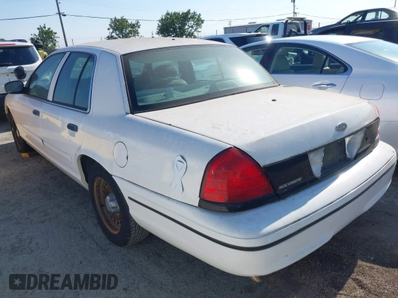 2000 Ford Crown Victoria Police Interceptor z VIN 2FAFP71W7YX104263, wystawiony jako IAAI lot #42442496 z przebiegiem 153 064 mil mil oraz . Historia ofert i sprzedaży dostępna na DreamBid. Obrazek 3.