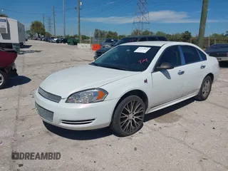 2013 Chevrolet Impala Police with VIN 2G1WD5E34D1227693, listed as a IAAI auction lot 41613853 with 163,891 mi miles. Bid and sale history available at carsss.com. Image 2.