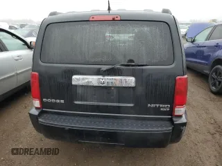2011 Dodge Nitro SXT z VIN 1D4PT5GK1BW544326, wystawiony jako Copart lot #85863564 z przebiegiem 259 017 mil mil oraz Szkoda całkowita • Salvage title. Historia ofert i sprzedaży dostępna na DreamBid. Obrazek 6.