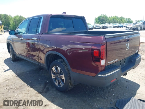 2019 Honda Ridgeline RTL-E with VIN 5FPYK3F72KB031085, listed as a IAAI auction lot 42236249 with 73,612 mi miles and . Bid and sale history available at DreamBid. Image 3.