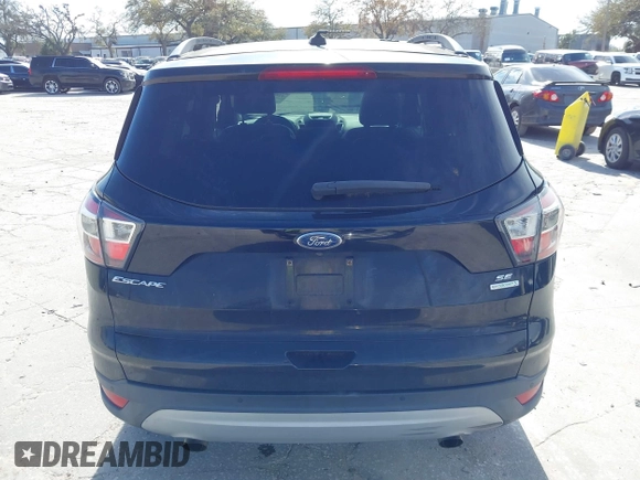 2017 Ford Escape SE with VIN 1FMCU0GDXHUB56573, listed as a IAAI auction lot 41694558 with 145,902 mi miles. Bid and sale history available at carsss.com. Image 17.
