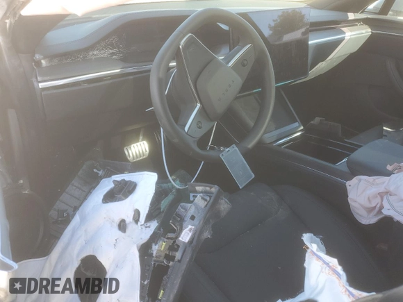 2024 Tesla Model S с VIN 5YJSA1E56RF541102, выставлен на аукционе Copart как лот 42584275 с пробегом Не указан миль и Списание • Salvage title. История ставок и продаж доступна на DreamBid. Изображение 8.