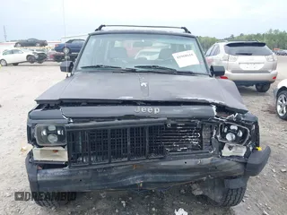 1994 Jeep Cherokee Sport with VIN 1J4FJ68S1RL160023, listed as a IAAI auction lot 41968610 with 255,978 mi miles. Bid and sale history available at carsss.com. Image 12.
