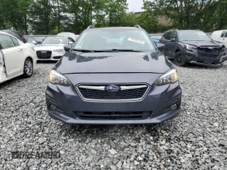 2017 Subaru Impreza Premium z VIN 4S3GTAD6XH3703075, wystawiony jako Copart lot #59928165 z przebiegiem 95 866 mil mil oraz Szkoda całkowita • Salvage title. Historia ofert i sprzedaży dostępna na DreamBid. Obrazek 5.