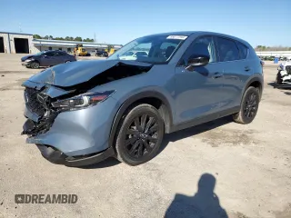 2024 Mazda CX-5 2.5 S Carbon Edition with VIN JM3KFBCL4R0459948, listed as a Copart auction lot 86877594 with 21,449 mi miles and Salvage Title. Bid and sale history available at carsss.com. Image 1.