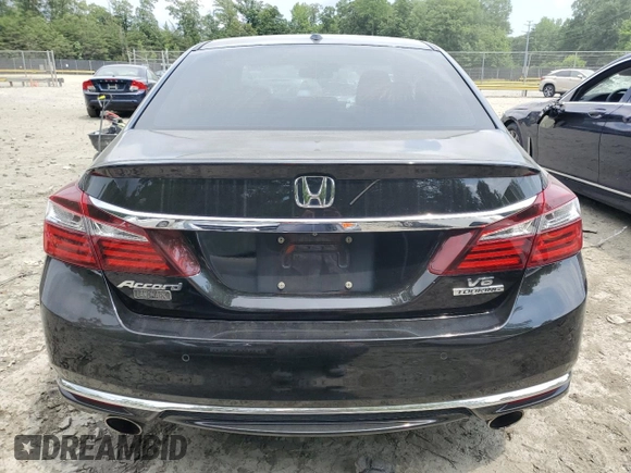 2017 Honda Accord Touring with VIN 1HGCR3F96HA019458, listed as a Copart auction lot 59915105 with 135,739 mi miles and Salvage title. Bid and sale history available at DreamBid. Image 6.