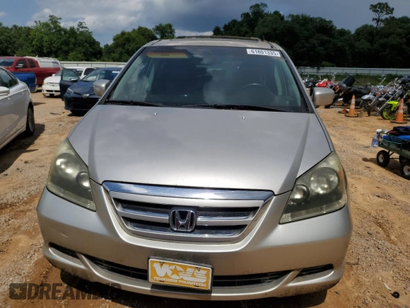 2006 Honda Odyssey EX-L z VIN 5FNRL387X6B458818, wystawiony jako Copart lot #61801335 z przebiegiem 227 179 mil mil oraz Czysty tytuł • Clean title. Historia ofert i sprzedaży dostępna na DreamBid. Obrazek 5.