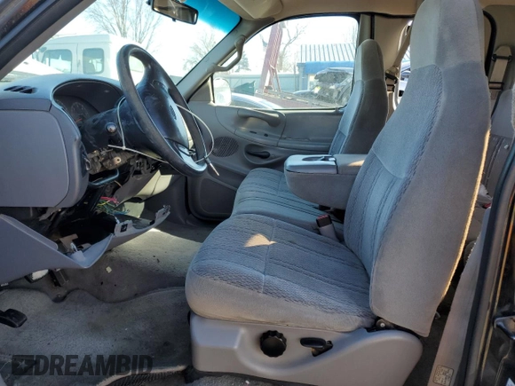 1997 Ford F-150 XL with VIN 1FTDX1866VKB08985, listed as a Copart auction lot 43708935 with 208,670 mi miles and Salvage title. Bid and sale history available at DreamBid. Image 7.