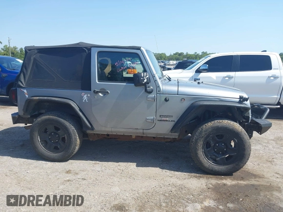 2014 Jeep Wrangler Sport with VIN 1C4AJWAG0EL126459, listed as a IAAI auction lot 42286803 with 179,025 mi miles and . Bid and sale history available at DreamBid. Image 13.