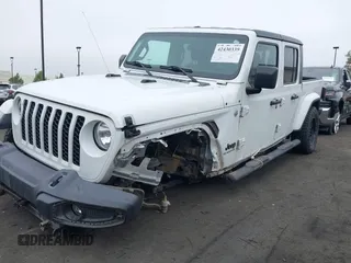 2020 Jeep Gladiator Sport S with VIN 1C6HJTAG9LL194454, listed as a IAAI auction lot 42430339 with 90,461 mi miles and . Bid and sale history available at DreamBid. Image 6.