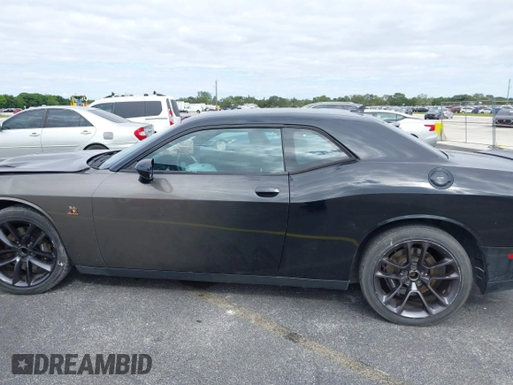 2016 Dodge Challenger R/T Scat Pack z VIN 2C3CDZFJ2GH254938, wystawiony jako IAAI lot #40888589 z przebiegiem 114 582 mil mil oraz . Historia ofert i sprzedaży dostępna na DreamBid. Obrazek 15.