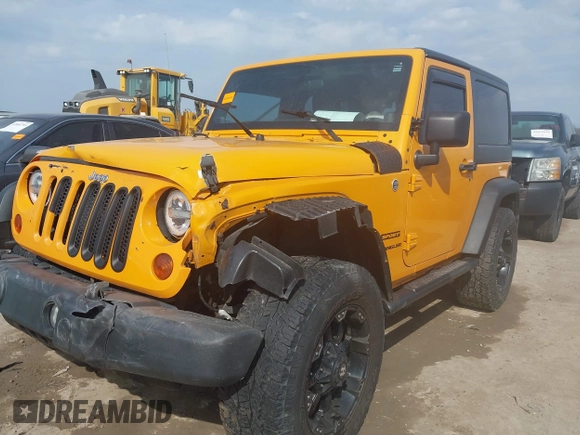 2012 Jeep Wrangler Sport with VIN 1C4AJWAG0CL128595, listed as a IAAI auction lot 42048590 with 133,085 mi miles and . Bid and sale history available at DreamBid. Image 17.