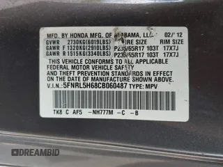 2012 Honda Odyssey EX-L with VIN 5FNRL5H68CB060487, listed as a IAAI auction lot 42176223 with 234,078 mi miles and . Bid and sale history available at DreamBid. Image 9.