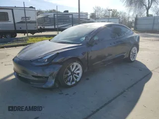 2022 Tesla Model 3 with VIN 5YJ3E1EAXNF360200, listed as a Copart auction lot 44463735 with 86,880 mi miles and Salvage Title. Bid and sale history available at DreamBid. Image 1.