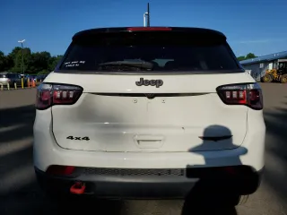 2018 Jeep Compass Trailhawk with VIN 3C4NJDDB9JT451745, listed as a Copart auction lot 61187255 with 88,923 mi miles and Salvage title. Bid and sale history available at DreamBid. Image 6.