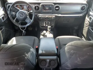 2023 Jeep Wrangler Sport S with VIN 1C4HJXDN9PW564543, listed as a Copart auction lot 56192945 with 42,015 mi miles and Salvage title. Bid and sale history available at DreamBid. Image 8.