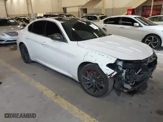 2017 Alfa Romeo Giulia with VIN ZARFAEDN1H7552738, listed as a IAAI auction lot 41529238 with 107,421 mi miles. Bid and sale history available at carsss.com. Image 1.