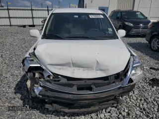 2009 Nissan Versa S z VIN 3N1BC13E79L490369, wystawiony jako Copart lot #51960035 z przebiegiem 160 125 mil mil oraz Nie do naprawy • Non repairable. Historia ofert i sprzedaży dostępna na DreamBid. Obrazek 5.