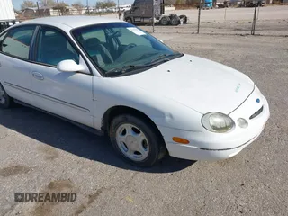 1997 Ford Taurus GL z VIN 1FALP52U0VG259565, wystawiony jako IAAI lot #41127969 z przebiegiem 157 244 mil mil oraz . Historia ofert i sprzedaży dostępna na DreamBid. Obrazek 1.