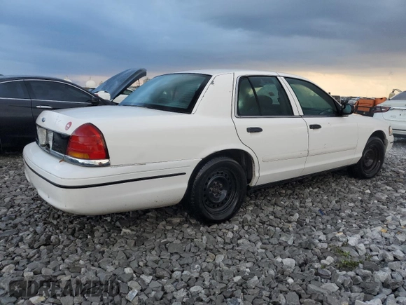 1999 Ford Crown Victoria Police z VIN 2FAFP71W4XX178478, wystawiony jako Copart lot #71813314 z przebiegiem 207 956 mil mil oraz Szkody całkowita. Historia ofert i sprzedaży dostępna na DreamBid. Obrazek 3.