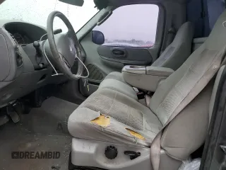 2003 Ford F-150 XL z VIN 1FTRF17263NA29013, wystawiony jako Copart lot #55668355 z przebiegiem 202 416 mil mil oraz Szkoda całkowita • Salvage title. Historia ofert i sprzedaży dostępna na DreamBid. Obrazek 7.