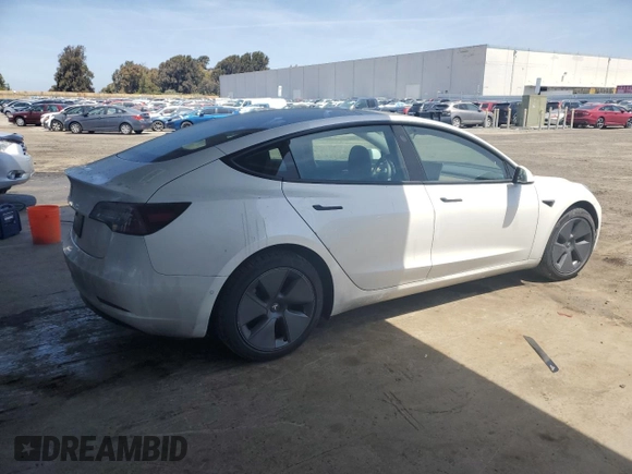 2021 Tesla Model 3 Standard Range Plus z VIN 5YJ3E1EA7MF078241, wystawiony jako Copart lot #57100525 z przebiegiem 56 700 mil mil oraz Szkoda całkowita • Salvage title. Historia ofert i sprzedaży dostępna na DreamBid. Obrazek 3.