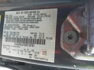 2016 Ford Fusion SE Hybrid with VIN 3FA6P0LU7GR218781, listed as a IAAI auction lot 41844791 with 214,867 mi miles. Bid and sale history available at carsss.com. Image 9.