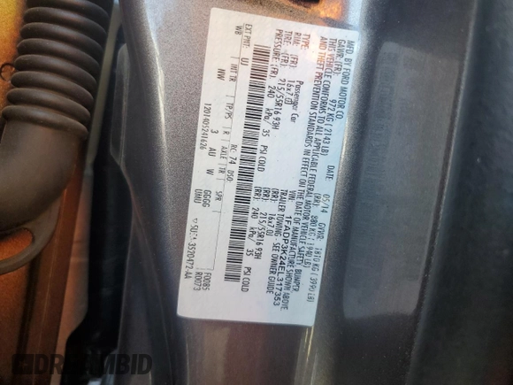 2014 Ford Focus SE z VIN 1FADP3K24EL317353, wystawiony jako Copart lot #57181215 z przebiegiem 144 495 mil mil oraz Szkoda całkowita • Salvage title. Historia ofert i sprzedaży dostępna na DreamBid. Obrazek 12.