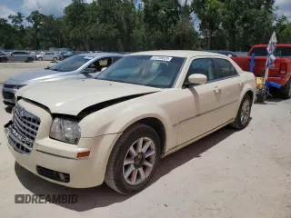 2009 Chrysler 300 Touring z VIN 2C3KA53V09H594340, wystawiony jako Copart lot #57789525 z przebiegiem 166 216 mil mil oraz Szkoda całkowita • Salvage title. Historia ofert i sprzedaży dostępna na DreamBid. Obrazek 1.
