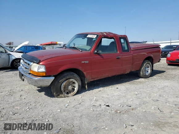 1999 Ford Ranger XL with VIN 1FTYR14V2XPA97269, listed as a Copart auction lot 52741825 with 142,302 mi miles and Salvage title. Bid and sale history available at DreamBid. Image 1.