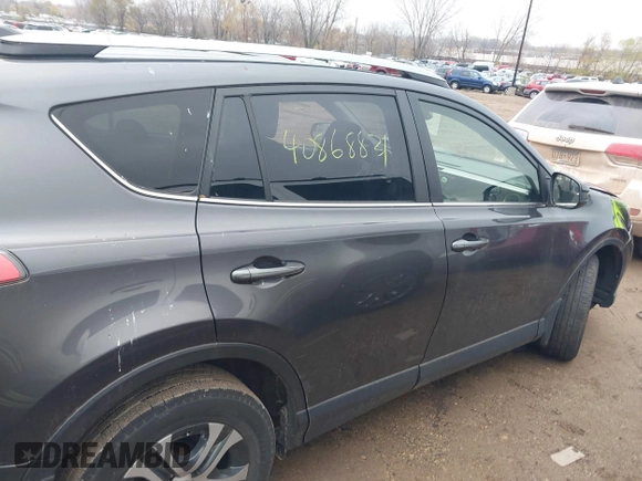 2017 Toyota RAV4 LE with VIN JTMBFREV3HJ704411, listed as a IAAI auction lot 40868831 with 102,729 mi miles. Bid and sale history available at carsss.com. Image 13.