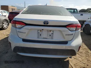 2021 Toyota Corolla Hybrid LE with VIN JTDEAMDE5MJ008370, listed as a Copart auction lot 52158845 with 148,071 mi miles and Salvage Title. Bid and sale history available at carsss.com. Image 6.