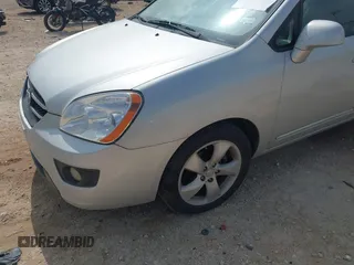 2007 Kia Rondo LX with VIN KNAFG526077069189, listed as a IAAI auction lot 42090474 with 96,722 mi miles. Bid and sale history available at carsss.com. Image 6.