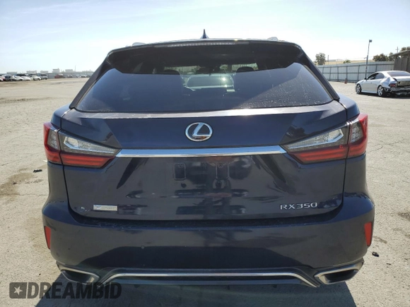 2017 Lexus RX 350 с VIN 2T2BZMCA2HC077279, выставлен на аукционе Copart как лот 57180655 с пробегом 70 575 миль миль и Списание • Salvage title. История ставок и продаж доступна на DreamBid. Изображение 6.