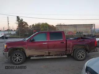 2015 GMC Sierra 1500 SLT with VIN 3GTU2VEJ9FG401660, listed as a IAAI auction lot 40648231 with 155,624 mi miles and . Bid and sale history available at DreamBid. Image 14.