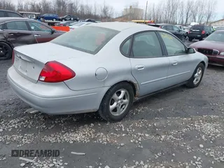 2003 Ford Taurus SES Standard with VIN 1FAFP55253A229632, listed as a IAAI auction lot 41867986 with 154,092 mi miles. Bid and sale history available at carsss.com. Image 4.