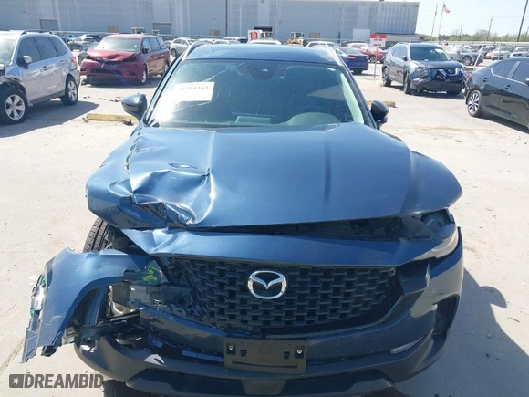 2023 Mazda CX-50 2.5 S Preferred Plus Package with VIN 7MMVABCM2PN129237, listed as a IAAI auction lot 41584165 with 43,174 mi miles. Bid and sale history available at carsss.com. Image 12.