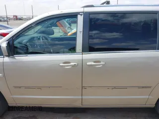 2014 Dodge Grand Caravan SXT with VIN 2C4RDGCG6ER466459, listed as a IAAI auction lot 41820907 with 105,404 mi miles and . Bid and sale history available at DreamBid. Image 13.
