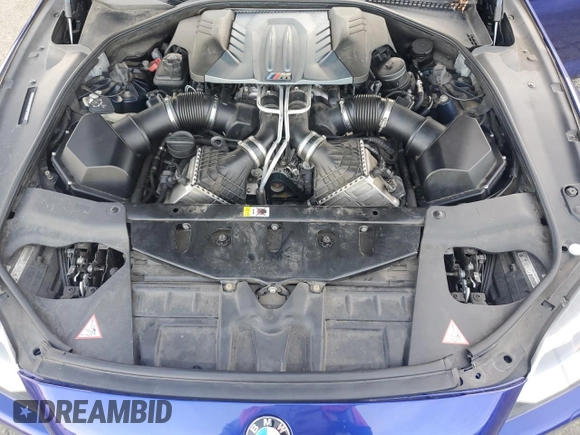 2014 BMW M6 z VIN WBS6C9C5XEDV73722, wystawiony jako Copart lot #87202664 z przebiegiem 68 283 mil mil oraz Szkoda całkowita • Salvage title. Historia ofert i sprzedaży dostępna na DreamBid. Obrazek 13.