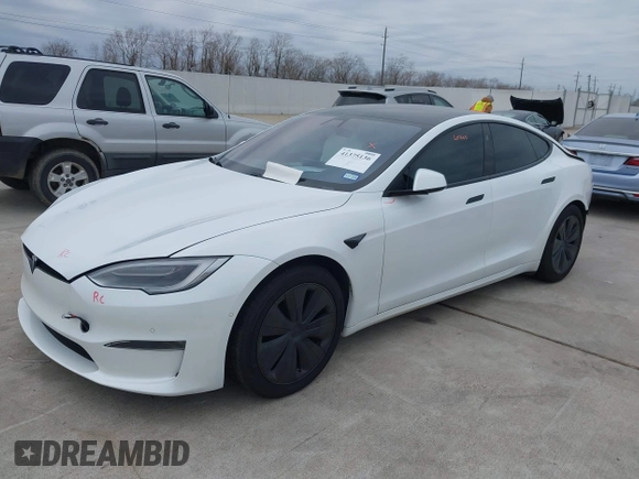 2021 Tesla Model S Plaid z VIN 5YJSA1E64MF452744, wystawiony jako IAAI lot #41375136 z przebiegiem Nie podano mil oraz . Historia ofert i sprzedaży dostępna na DreamBid. Obrazek 18.