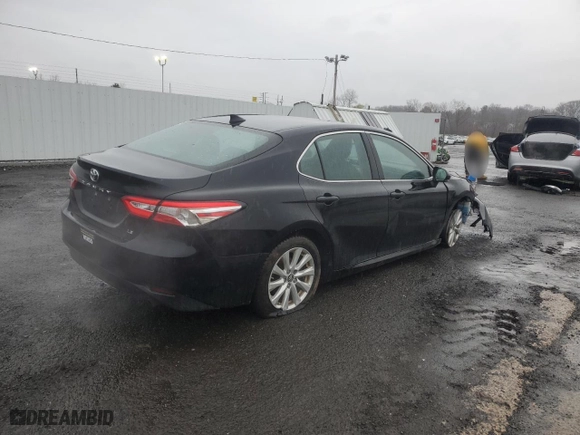 2019 Toyota Camry LE with VIN 4T1B11HK2KU222936, listed as a Copart auction lot 51669875 with 89,223 mi miles and Salvage Title. Bid and sale history available at carsss.com. Image 3.