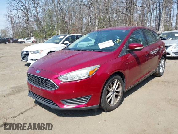 2015 Ford Focus SE with VIN 1FADP3K27FL289971, listed as a IAAI auction lot 41842582 with 96,450 mi miles. Bid and sale history available at carsss.com. Image 2.