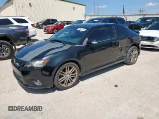 2012 Scion tC z VIN JTKJF5C74C3043115, wystawiony jako Copart lot #53921365 z przebiegiem 106 236 mil mil oraz Szkoda całkowita • Salvage title. Historia ofert i sprzedaży dostępna na DreamBid. Obrazek 1.