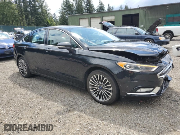 2017 Ford Fusion SE z VIN 3FA6P0H96HR150012, wystawiony jako Copart lot #56789925 z przebiegiem 167 772 mil mil oraz Szkoda całkowita • Salvage title. Historia ofert i sprzedaży dostępna na DreamBid. Obrazek 4.
