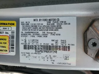 2019 Ford Fusion Titanium with VIN 3FA6P0D99KR105398, listed as a Copart auction lot 54786845 with 122,776 mi miles and Salvage title. Bid and sale history available at DreamBid. Image 13.